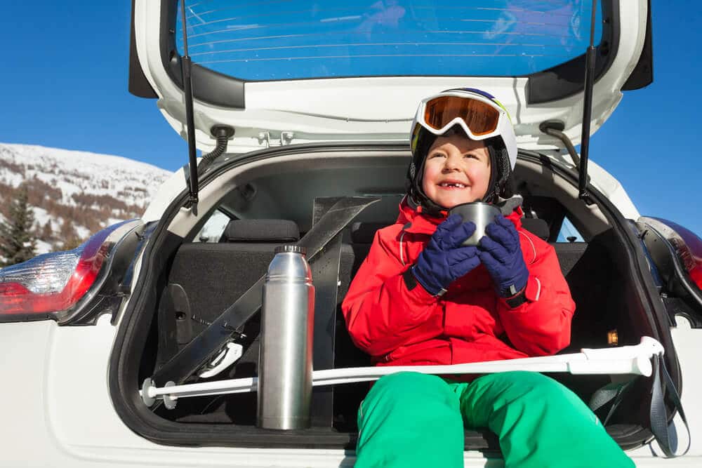 Photo of a Child on a Ski Lift. Skiing is One of the Best Things to Do in Maine in Winter.