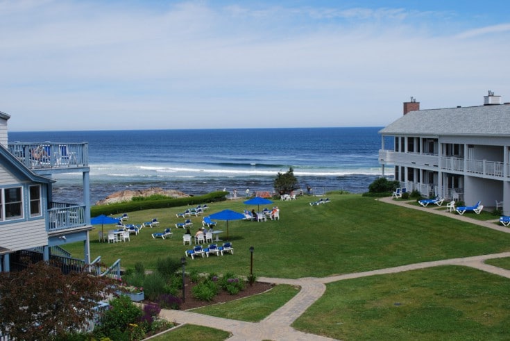View from the terrace of a hotel room to the greenery and the ocean