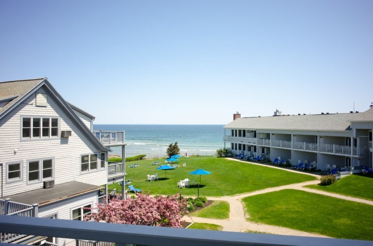 View from the terrace of a hotel room to the greenery and the ocean