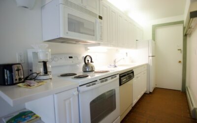 Kitchen with microwave and coffee machine in a hotel room