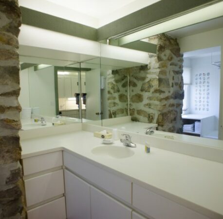 Bathroom with sink, mirrors and ice lights in Mayfair, room 401